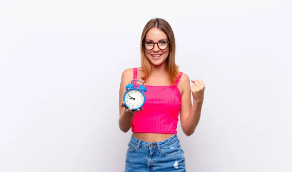 Red Head Pretty Woman Holding Alarm Clock Expressing Concept — Stock Photo, Image