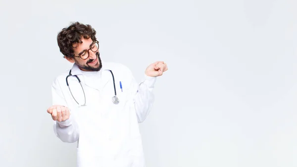 Young Doctor Man Smiling Feeling Carefree Relaxed Happy Dancing Listening — Stock Photo, Image