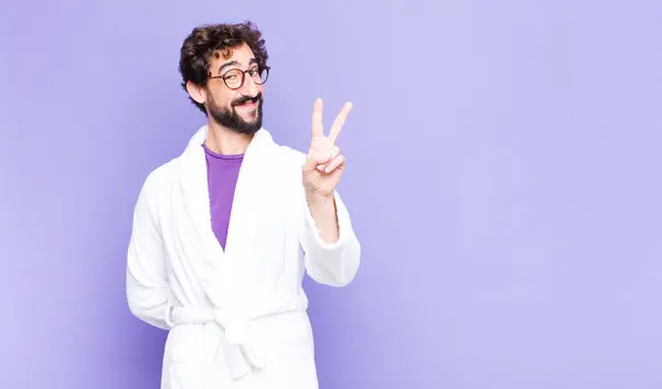 Young Bearded Man Wearing Bathrobe Smiling Looking Happy Carefree Positive — Stock Photo, Image