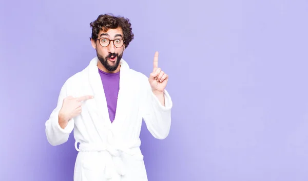 Young Bearded Man Wearing Bathrobe Feeling Proud Surprised Pointing Self — Stock Photo, Image