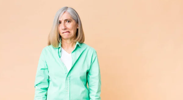Middle Age Cool Woman Looking Puzzled Confused Biting Lip Nervous — Stock Photo, Image