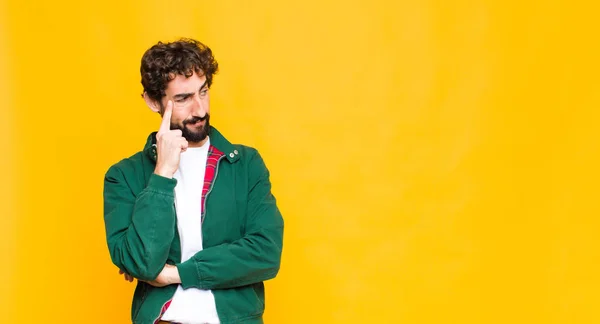 Young Crazy Bearded Man Concentrated Look Wondering Doubtful Expression Looking — Stock Photo, Image