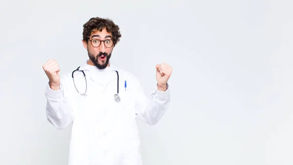Young Doctor Man Celebrating Unbelievable Success Winner Looking Excited Happy — Stock Photo, Image