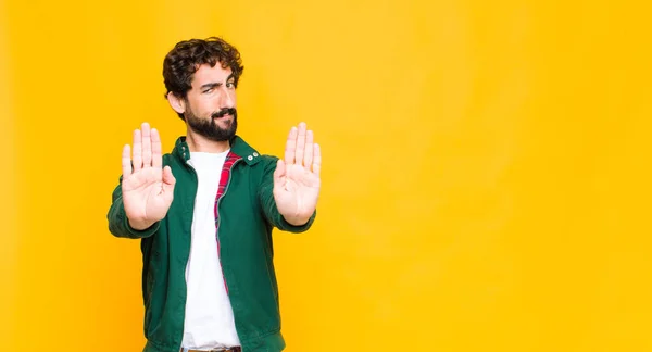 Young Crazy Bearded Man Looking Serious Unhappy Angry Displeased Forbidding Stock Photo