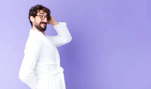 Young Crazy Bearded Man Wearing Bathrobe Copy Space Wall — Stock Photo, Image