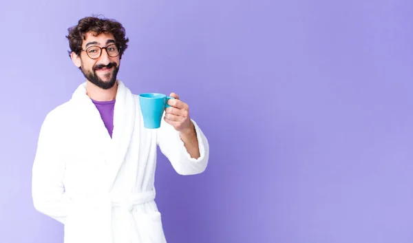 Young Crazy Bearded Man Wearing Bathrobe Having Coffee — Stock Photo, Image