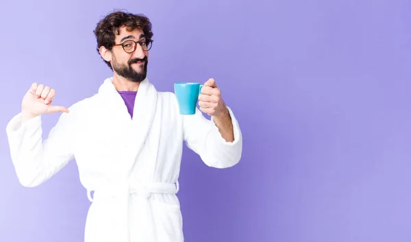 Young Crazy Bearded Man Wearing Bathrobe Having Coffee — Stock Photo, Image