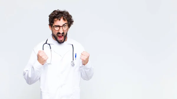 Young Doctor Man Shouting Aggressively Annoyed Frustrated Angry Look Tight — Stock Photo, Image