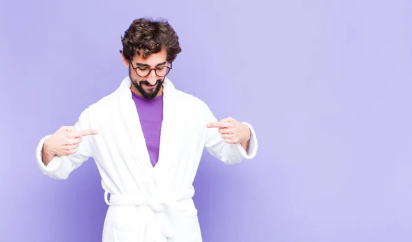 Young Bearded Man Wearing Bathrobe Looking Proud Positive Casual Pointing — Stock Photo, Image