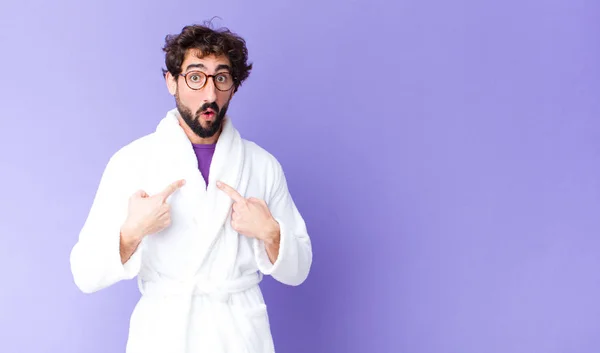 Young Bearded Man Wearing Bathrobe Pointing Self Confused Quizzical Look — Stock Photo, Image
