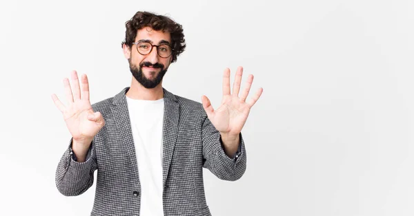 Junger Verrückter Geschäftsmann Lächelt Und Sieht Freundlich Aus Zeigt Nummer — Stockfoto