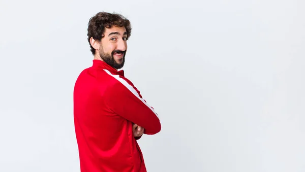 Jovem Barbudo Homem Visão Traseira Sorrindo Para Câmera Com Braços — Fotografia de Stock