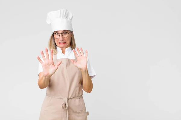 Middle Age Baker Woman Feeling Terrified Backing Screaming Horror Panic — Stock Photo, Image
