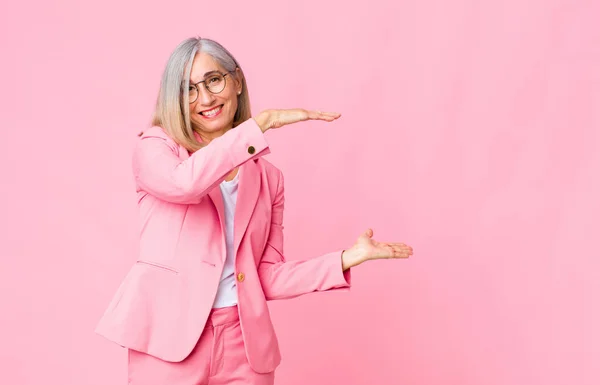 Middle Age Cool Woman Holding Object Both Hands Side Copy — Stock Photo, Image