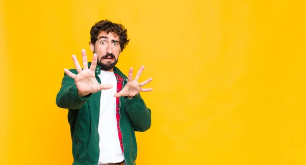 Young Crazy Bearded Man Feeling Terrified Backing Screaming Horror Panic Stock Photo