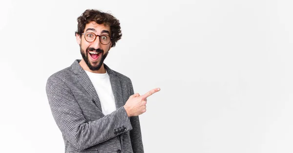 Young Crazy Businessman Looking Excited Surprised Pointing Side Upwards Copy Stock Photo
