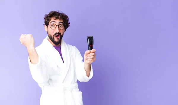 Young Crazy Bearded Man Wearing Bathrobe Razor Shaver — Stock Photo, Image