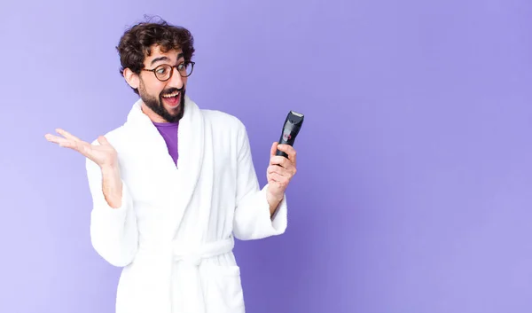 Young Crazy Bearded Man Wearing Bathrobe Razor Shaver — Stock Photo, Image