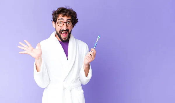 Young Crazy Bearded Man Wearing Bathrobe Teeth Brush — Stock Photo, Image