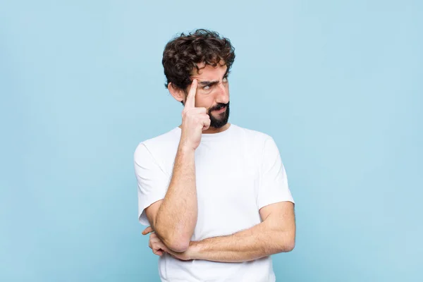 Young Crazy Bearded Man Concentrated Look Wondering Doubtful Expression Looking — Stock Photo, Image