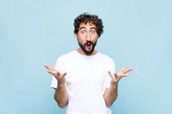 Young Crazy Bearded Man Feeling Extremely Shocked Surprised Anxious Panicking — Stock Photo, Image