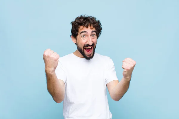 Young Crazy Bearded Man Feeling Happy Positive Successful Celebrating Victory — Stock Photo, Image