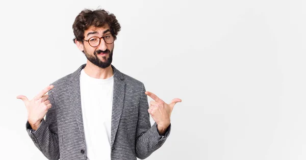 Young Crazy Businessman Bad Attitude Looking Proud Aggressive Pointing Upwards Royalty Free Stock Images
