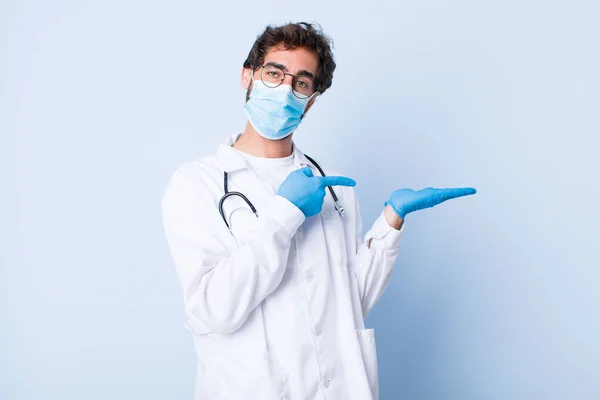 Young Man Smiling Cheerfully Pointing Copy Space Palm Side Showing — Stock Photo, Image