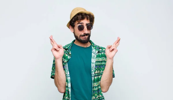 Young Tourist Man Crossing Fingers Anxiously Hoping Good Luck Worried — Stock Photo, Image