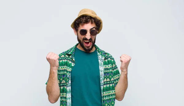 Young Tourist Man Shouting Aggressively Angry Expression Fists Clenched Celebrating — Stock Photo, Image