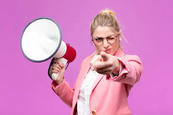 young pretty blonde woman with a megaphone