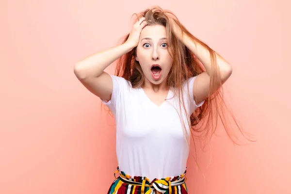 Yound Blonde Woman Feeling Horrified Shocked Raising Hands Head Panicking — Stock Photo, Image