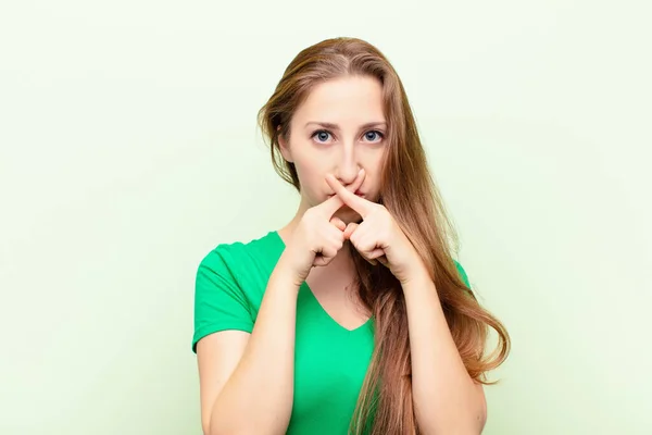 Yound Blonde Woman Looking Serious Displeased Both Fingers Crossed Front — Stock Photo, Image