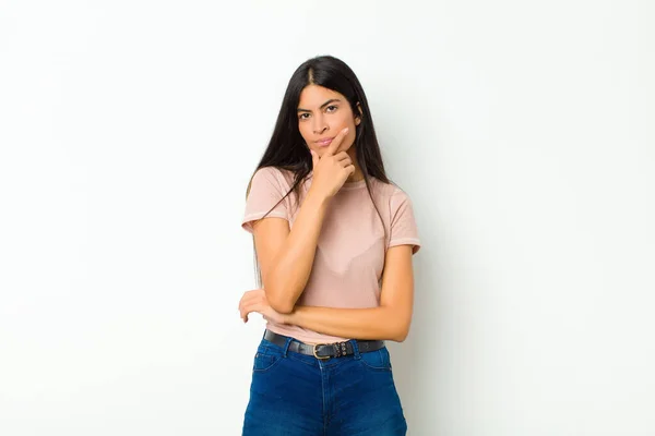 Young Pretty Latin Woman Looking Serious Thoughtful Distrustful One Arm — Stock Photo, Image
