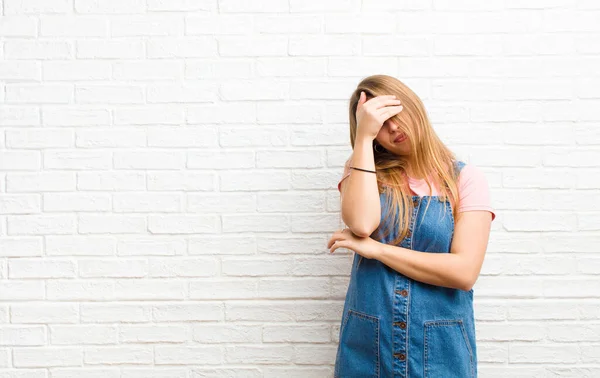 Young Blonde Woman Looking Stressed Ashamed Upset Headache Covering Face — Stock Photo, Image