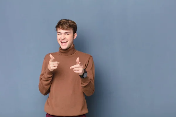 Young Blonde Man Smiling Positive Successful Happy Attitude Pointing Camera — Stock Photo, Image