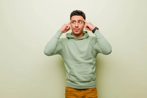 Young Arabian Man Feeling Confused Doubting Concentrating Idea Thinking Hard — Stock Photo, Image