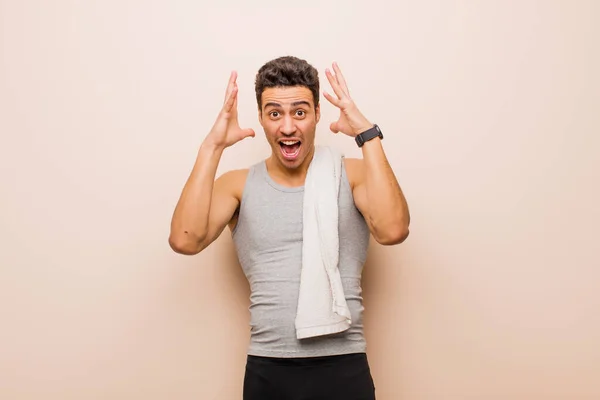 Young Arabian Man Screaming Hands Air Feeling Furious Frustrated Stressed — Stock Photo, Image