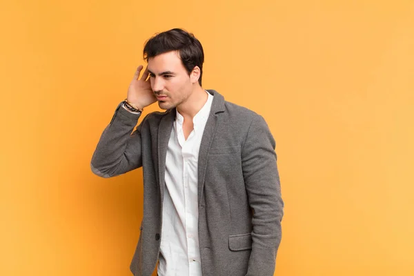 Young Handsome Man Looking Serious Curious Listening Trying Hear Secret — Stock Photo, Image