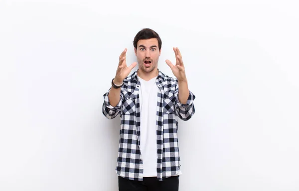 Young Handsome Man Screaming Hands Air Feeling Furious Frustrated Stressed — Stock Photo, Image