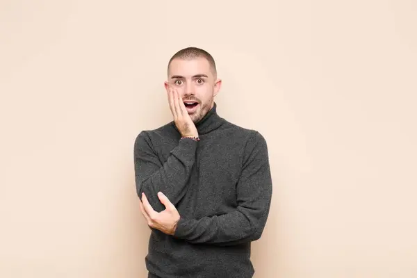 Young Handsome Man Open Mouthed Shock Disbelief Hand Cheek Arm — Stock Photo, Image