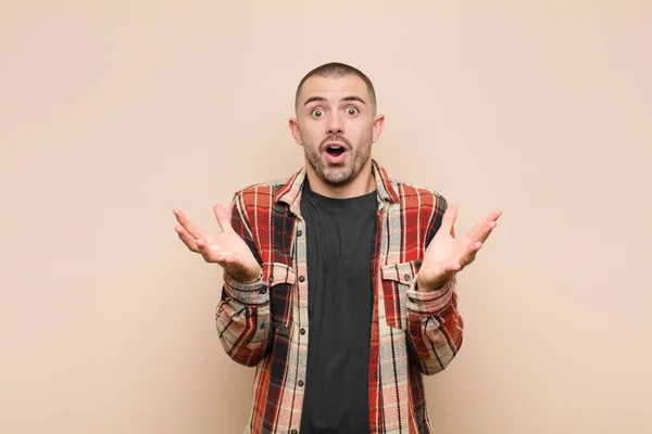 Young Handsome Man Feeling Extremely Shocked Surprised Anxious Panicking Stressed — Stock Photo, Image