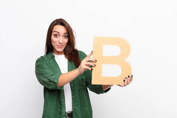 Young Pretty Woman Confused Doubtful Thinking Holding Letter Alphabet Form — Stock Photo, Image