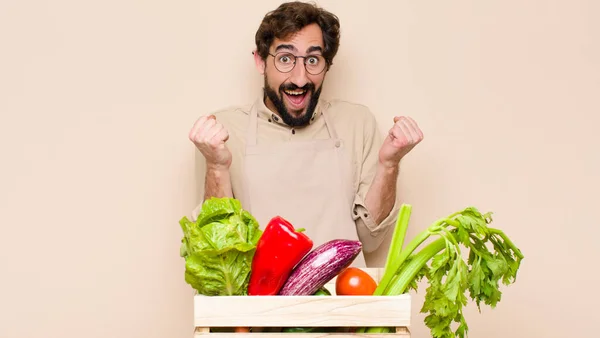 Green Grocery Man Feeling Shocked Excited Happy Laughing Celebrating Success — Stock Photo, Image
