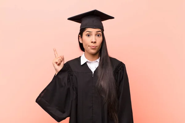 Young Latin Woman Student Feeling Genius Holding Finger Proudly Air — Stock Photo, Image