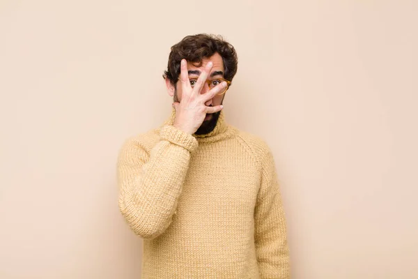 Young Cool Man Looking Shocked Scared Terrified Covering Face Hand — Stock Photo, Image