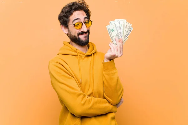 Young Crazy Cool Man Dollar Banknotes Orange Wall — Stockfoto