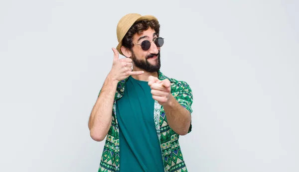 Young Tourist Man Smiling Cheerfully Pointing Camera While Making Call — Stock Photo, Image