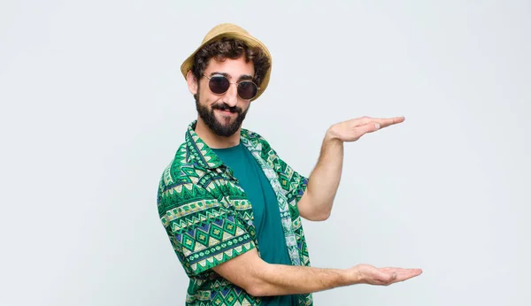 Young Tourist Man Holding Object Both Hands Side Copy Space — Stock Photo, Image