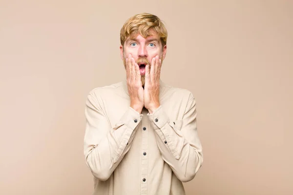 Young Blonde Man Feeling Shocked Scared Looking Terrified Open Mouth — Stock Photo, Image